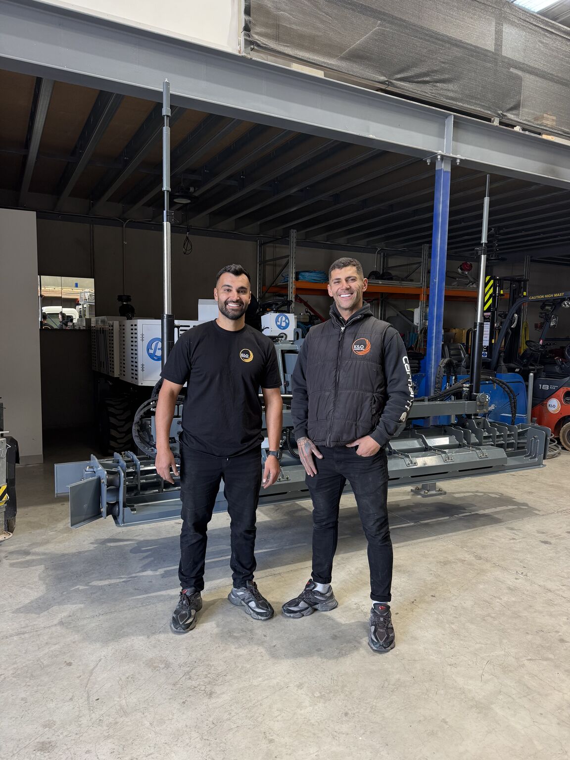 K&O Concrete Group team with concrete flooring equipment